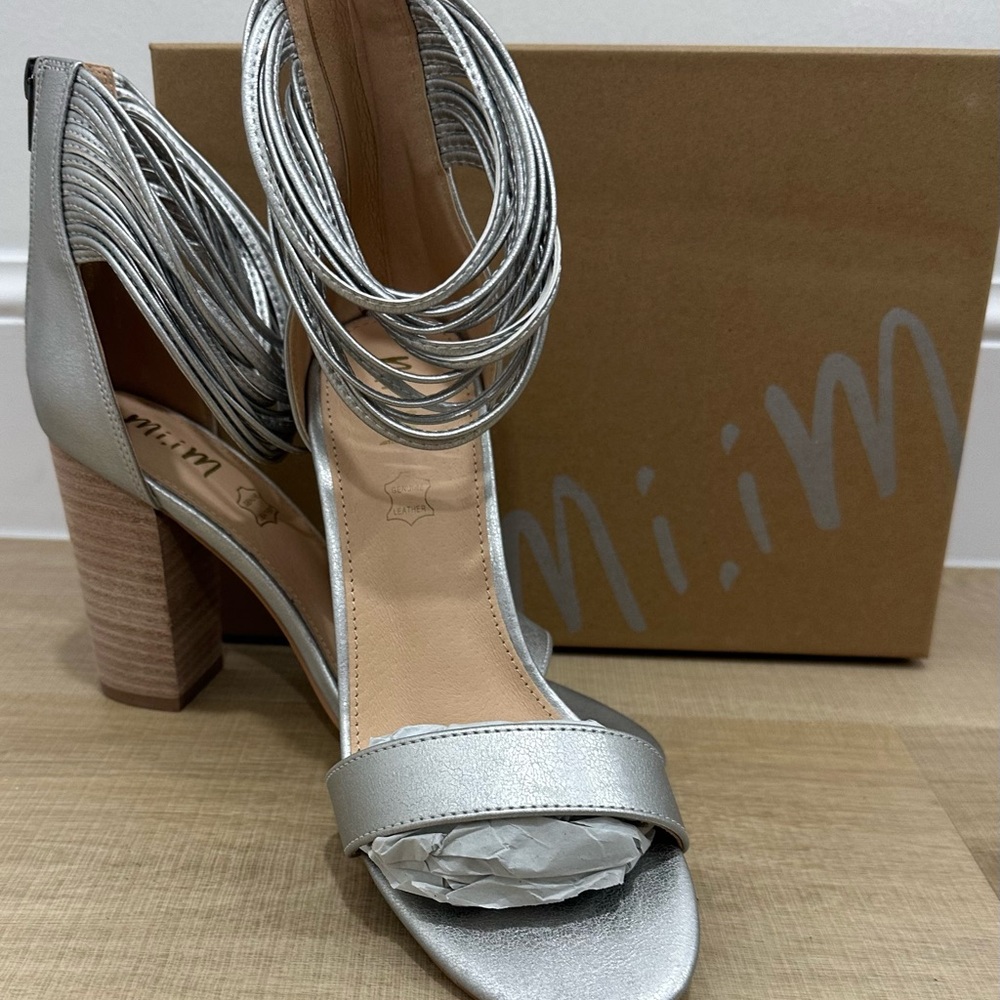 Shiny silver heels